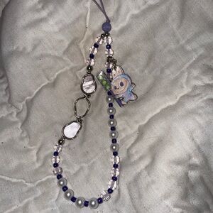 Purple labubu phone strap
